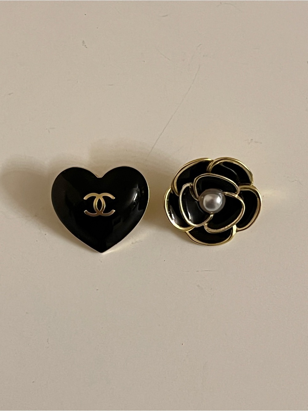 Chanel Black Heart and Camellia 2023 holiday wrapping charms with fabric back.